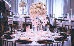 a dining table filled with wine glasses