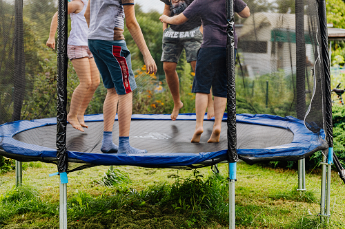 a group of people on a trampoline