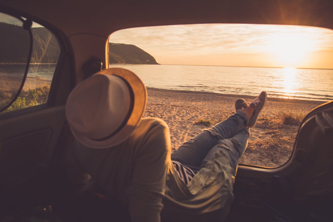 a person sitting in a car